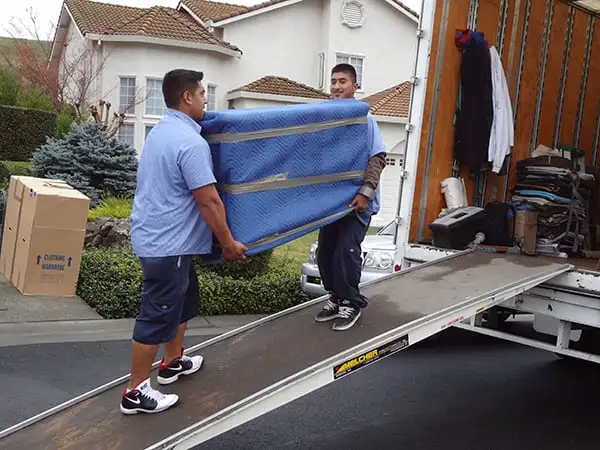 movers carrying item